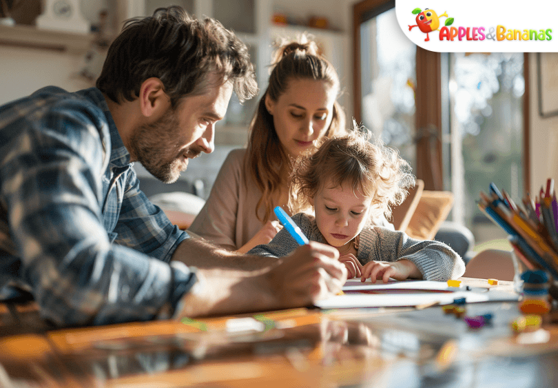 A parent helping their child with a learning activity at home, both smiling and engaged, surrounded by educational materials like books, pencils, and flashcards.