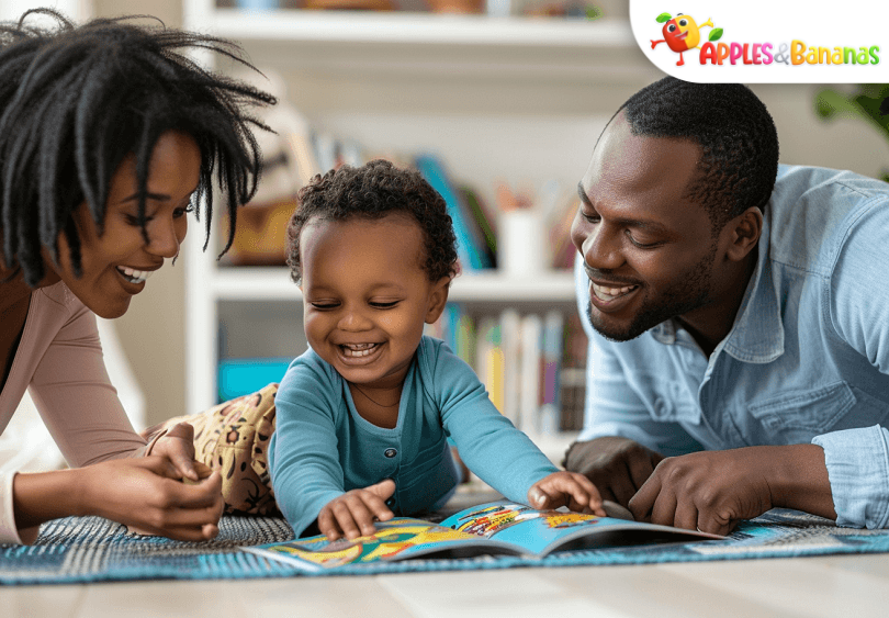 A parent and baby looking at a colorful picture book together, smiling and bonding during playtime.