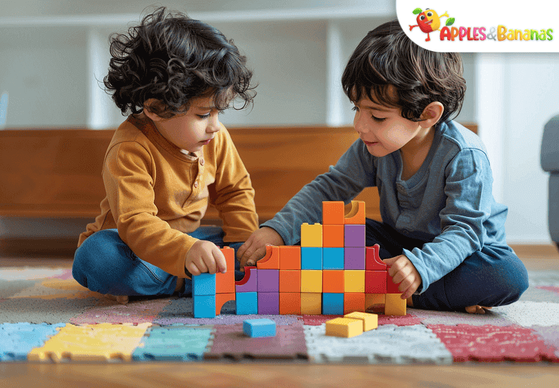 A curious young child playing with colorful building blocks, engaged in problem-solving and exploration in a bright, playful learning environment.