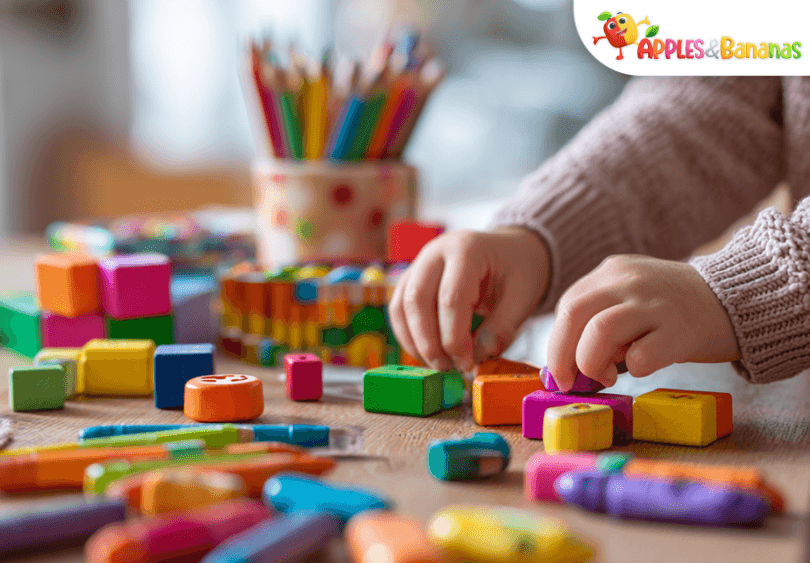 Preschool child learning through play at home with educational toys